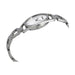 Montre femme Calvin Klein Dainty en acier poli argenté, cadran nacre blanc et cristaux éclatants, sur fond blanc pur, Maison Mercier.