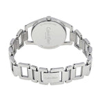 Montre femme Calvin Klein Dainty en acier poli argenté, cadran nacre blanc et cristaux éclatants, sur fond blanc pur, Maison Mercier.