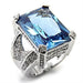 Bague de cocktail luxueuse en argent 925 avec pierre bleue intense, présentée sur fond blanc, Maison Mercier.