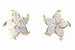 Détail rapproché d'une boucle d'oreille florale en plaqué or avec pavage d'oxydes de zirconium, Maison Mercier.