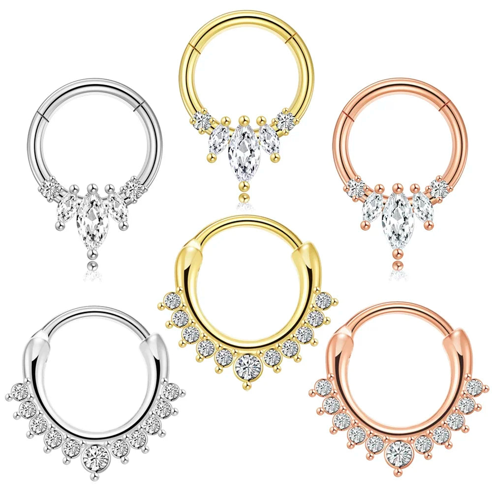 Assortiment de six piercings clicker septum, daith et hélix en acier chirurgical, présentant deux designs distincts ornés de zircons ronds et marquise, déclinés en finitions argentée, dorée et or rose, Maison Mercier.