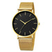 Montre féminine Maison Mercier, cadran noir épuré, bracelet maille milanaise finition or rose, portée au poignet avec un bracelet délicat à perles dorées.