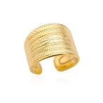 Bague en acier inoxydable doré, avec un motif texturé unique qui évoque un artisanat d'exception, Maison Mercier.