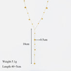 Vue détaillée du collier lariat Y doré avec ses perles, indiquant une longueur de chute de 10cm et un diamètre de perle de 0.5cm, poids 5.1g, longueur totale 40+5cm.