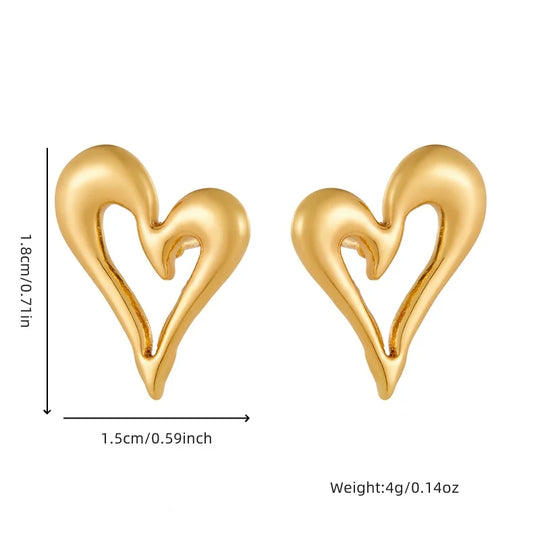 Paire de boucles d'oreilles doubles anneaux en acier inoxydable doré, finition polie, Maison Mercier.