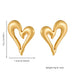 Paire de boucles d'oreilles doubles anneaux en acier inoxydable doré, finition polie, Maison Mercier.