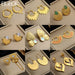 Vue d'ensemble d'un collage présentant neuf paires de boucles d'oreilles dorées aux designs variés, Maison Mercier.