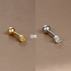 Sélection de piercings d'oreille pour femme, alliant la robustesse de l'acier chirurgical à la délicatesse des zircons.