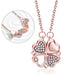 Collier pendentif transformable cœurs trèfle en acier doré et zirconia, présenté ouvert en ligne de cœurs et fermé en trèfle, sur fond bleu profond, Maison Mercier.