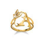 Bague multi-rangs dorée, combinant des textures lisses et granulées pour un effet sophistiqué, Maison Mercier.