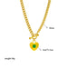Collage de quatre créations Maison Mercier : un collier double chaîne avec pendentif rond noir, un collier chaîne gourmette avec pendentif cœur vert, un bracelet chaîne avec pendentif cœur et ovale noir, et un collier double chaîne avec étoiles et pendentif rectangulaire bleu.