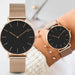 Montre féminine Maison Mercier, cadran noir épuré, bracelet maille milanaise finition or rose, portée au poignet avec un bracelet délicat à perles dorées.