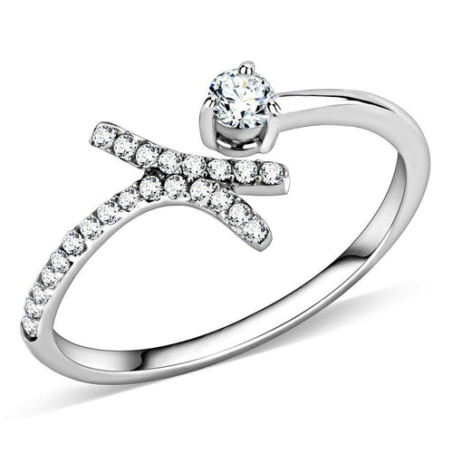 Vue détaillée d'une bague ouverte asymétrique en acier rhodié, ornée d'un zircon solitaire et d'un pavé de cristaux étincelants, Maison Mercier.