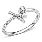 Vue détaillée d'une bague ouverte asymétrique en acier rhodié, ornée d'un zircon solitaire et d'un pavé de cristaux étincelants, Maison Mercier.