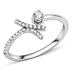Vue détaillée d'une bague ouverte asymétrique en acier rhodié, ornée d'un zircon solitaire et d'un pavé de cristaux étincelants, Maison Mercier.