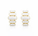 Paire de boucles d'oreilles pendantes à maillons oblongs émaillés blanc pur, finition or précieux, sur fond blanc immaculé, Maison Mercier.