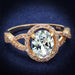 Détail d'une bague solitaire ovale en Argent 925, ornée d'une Zirconia lumineuse et d'un halo rose doré entrelacé, Maison Mercier.